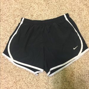 Black Nike running shorts